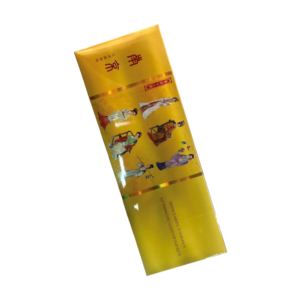 Golden yellow Chinese cigarette pack with traditional artwork and cultural design, premium imported tobacco product