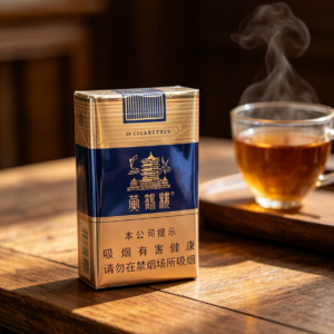 Yellow Crane Tower Blue Pack Chinese cigarette pack on wooden table with tea cup premium blue and gold tobacco packaging